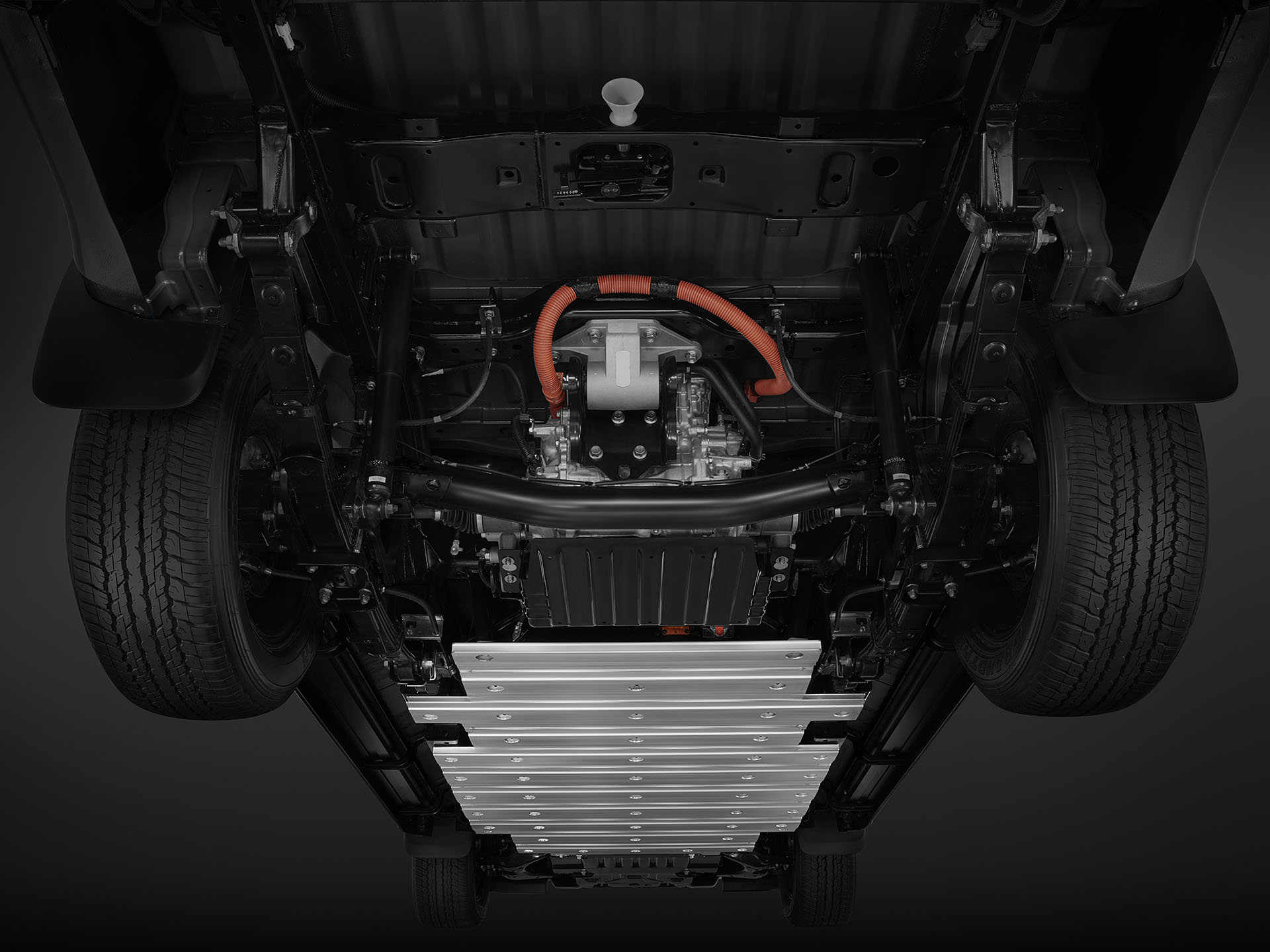 Isuzu D-Max BEV – närbild på underkörningsskyddet som skyddar viktiga komponenter under eldrivna pickupen.